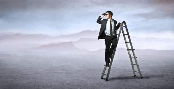 Skip Tracing photo of a man using binoculars to search the horizon